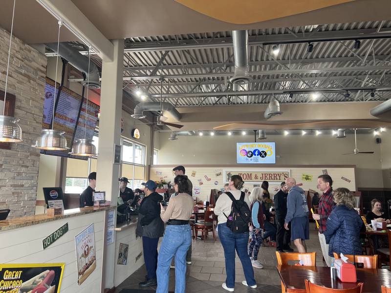Hungry diners wait in line to place their orders at Tom & Jerry's for the first time in at least five weeks on March 7, 2026. The restaurant's former location was demolished in February after it was left irreparable following a Jan. 31 fire.