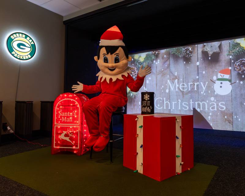 Elf awaits letters to Santa at the annual Christmas in the Valley on Saturday, November 15, 2025 at the Tee Box in Spring Valley.