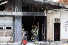 Sterling business damaged when vehicle fire spreads to structure