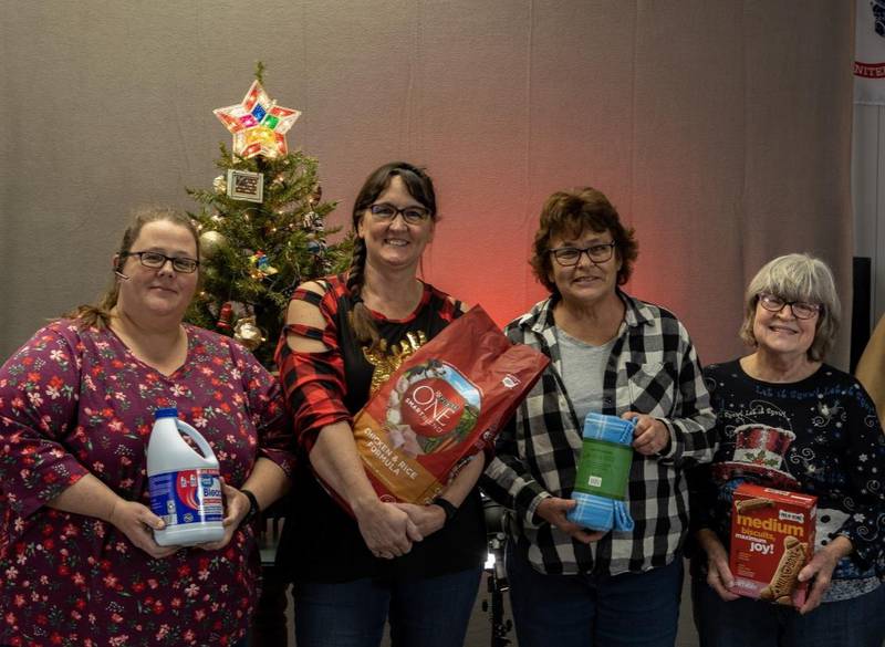 Members of the Leland American Legion Auxiliary Unit 570 pose with a few donated items from the auxiliary’s Thanks For Giving item drive for Illinois Valley Animal Rescue of Peru. They are (left to right) Lori Ann Head (bleach), Cathy Brown (dog food), Mary Yeager (blanket), and Patricia Barnhardt (dog bones), all from Leland.