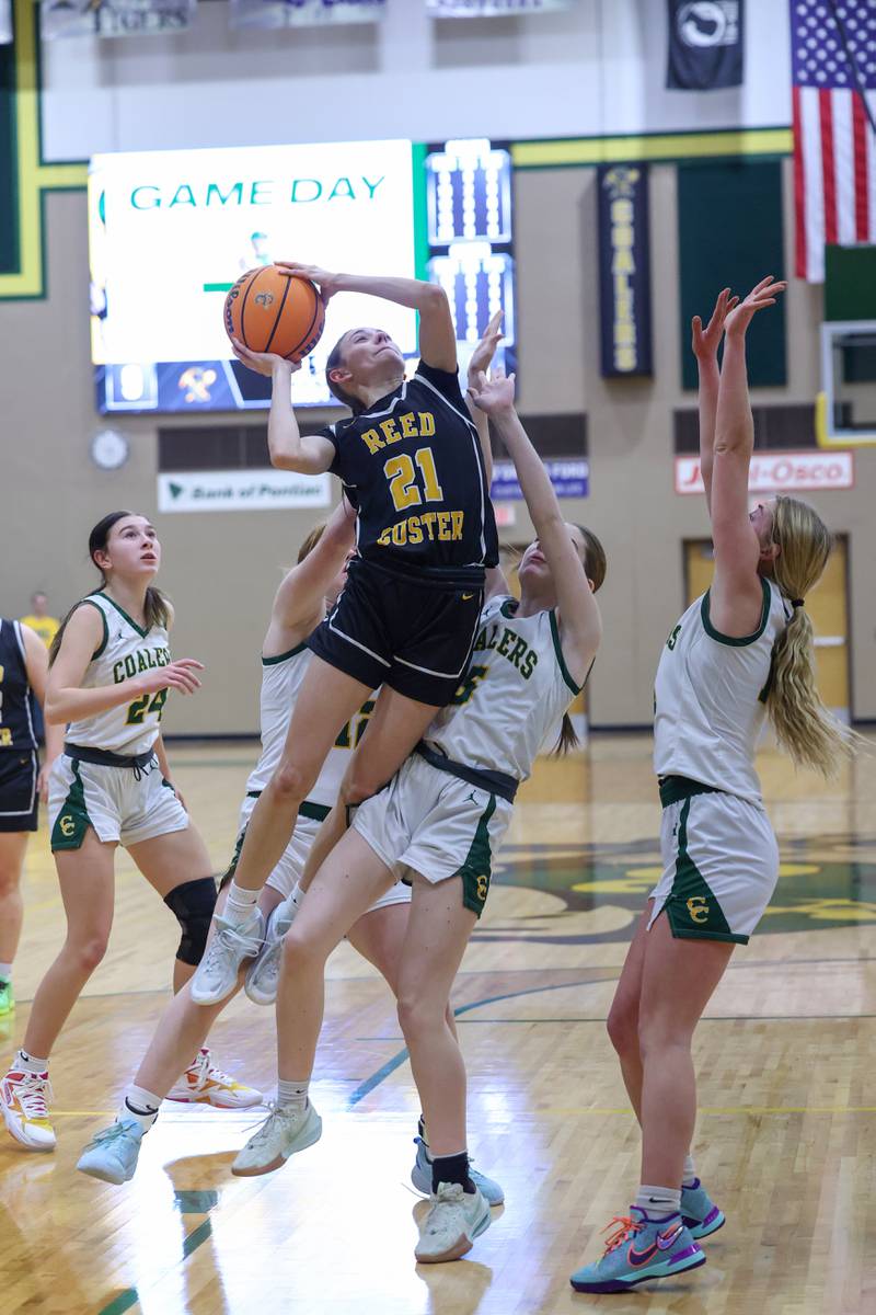 Reed-Custer's Alyssa Wollenzien goes up for a shot under pressure during the Comets' 50-43 victory over Coal City on Monday, Jan. 11, 2026.
