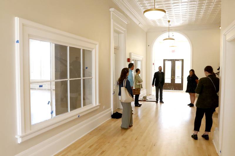 Woodstock City planner Darrell Moore talks about the newly remodeled Old Courthouse Center in Woodstock on Thursday, July 13, 2023, during a tour of the building.