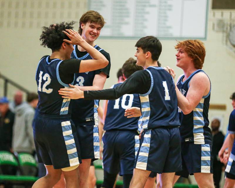 Nazareth celebrates the win over Glenbard West in their Jack Tosh Holiday Classic basketball tournament game. Thursday Dec 26, 2024 in Elmhurst.