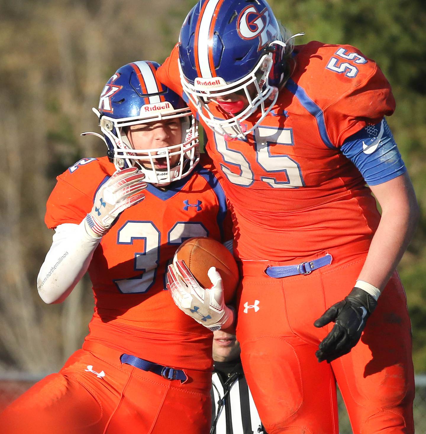 Genoa-Kingston's Colton Halter celebrates his touchdown with Declan Creadon Saturday, Nov. 6, 2021, during their IHSA Class 4A playoff game against St. Francis at Genoa-Kingston High School.