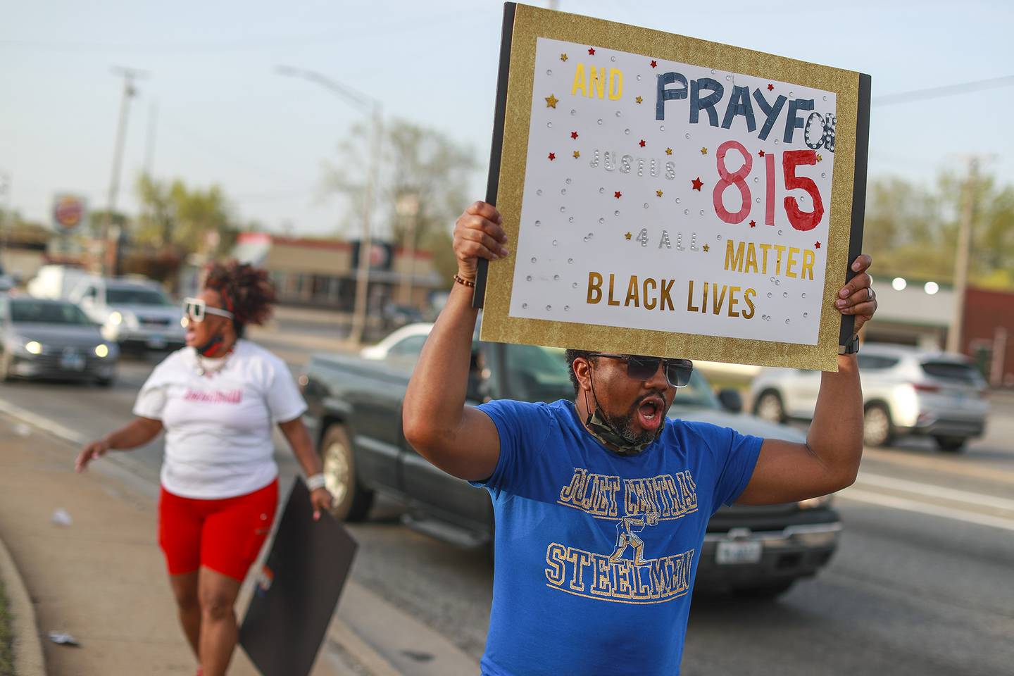 Bernell Simmons of the organization AndJustUsForAll calls for justice for Eric Lurry, a Joliet man who died of an overdose in police custody, on Tuesday, April 27, 2021, at the corner of Larkin Ave. and Jefferson st. in Joliet, Ill.