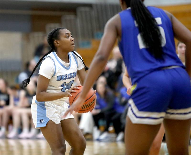 Downers Grove South's Ionna Griffin looks to pass the ball during the West Suburban Conference championship game against Lyons Township on Thursday, Feb. 13, 2025 at Willowbrook High School.