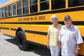 ‘Family keeps me coming back’: Woodland couple still rolling after 101 years combined busing students