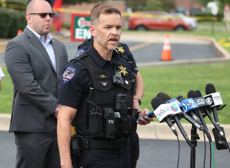 Oswego Police Chief Jason Bastin speaks Wednesday, July 30, 2025, during a press conference after a car crashed into the entrance of the Portillo’s at 2810 U.S. Route 34 in Oswego.