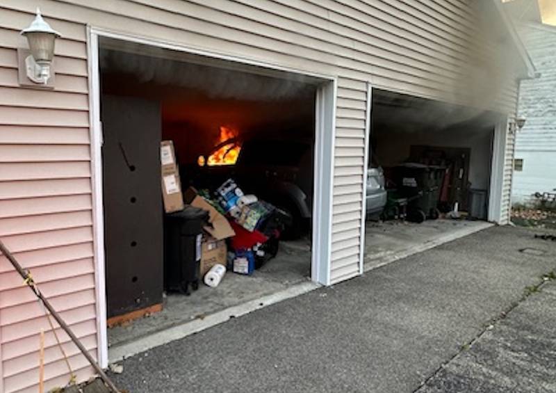 A car fire started in an attached garage of a Lake in the Hills home was quickly extinguished before it spread to the home Tuesday morning, officials report.