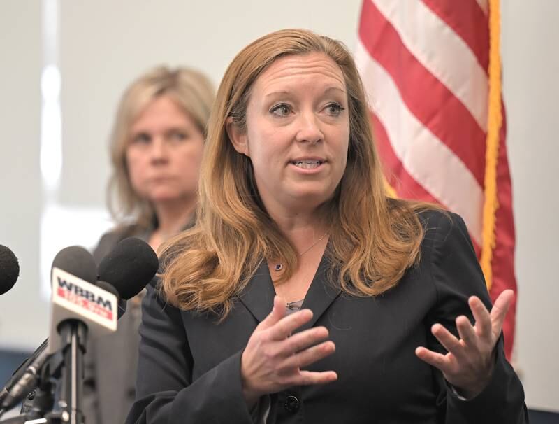 Kane County States Attorney Jamie L. Moser speaks at a press conference announcing the formation of a Human Exploitation Unit at the St. Charles Police Department on Monday, March 17, 2025. Behind her is St. Charles Mayor Lora Vitek.