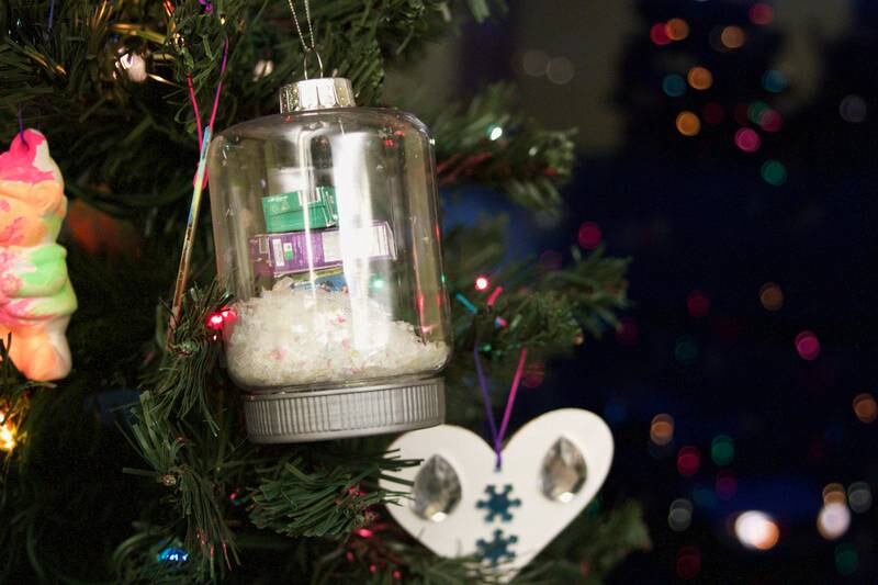 File photo: Girl Scout Troops 319, 1599, and 2309 decorated their entry in Montgomery's Festival of Trees in December 2021 with hand-painted ornaments, and ornaments featuring miniature boxes of cookies.