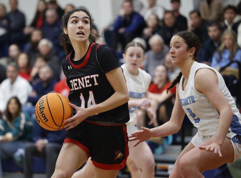 Benet's Audrey Panoushis (14) drives to the basket during a girls varsity basketball game between Benet and Nazareth academies on Saturday, Dec. 14, 2024 in La Grange Park.