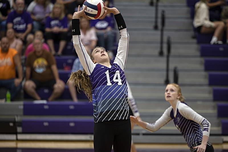 Dixon’s Leah Carlson sets the ball against DeKalb Tuesday, Sept. 5, 2023 in a game at Dixon High School.