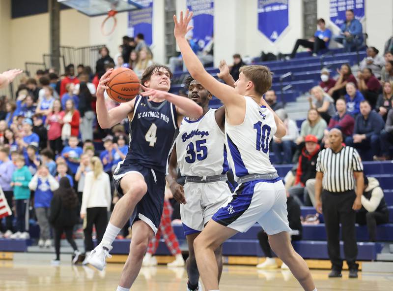 ICCP's Dean O'Brien (4) drives to the basket during the boys varsity basketball game between IC Catholic Prep and Riverside Brookfield in Riverside on Tuesday, Jan. 24, 2023.