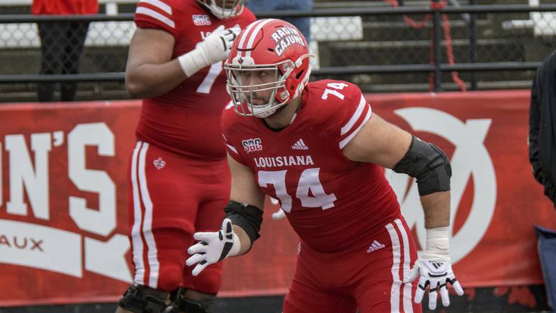 Louisiana-Lafayette offensive lineman Max Mitchell warms up before playing Louisiana-Monroe on Nov. 27, 2021 in Lafayette, La.