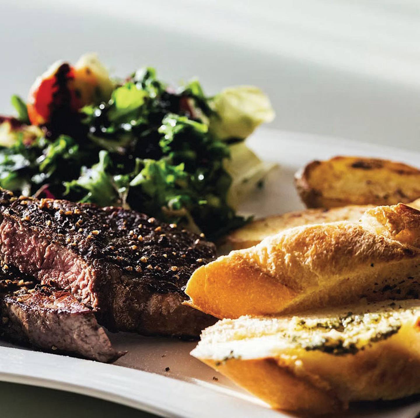 Those craving a well-marbled, expertly seasoned steak can choose from three options of dry aged prime cuts, including filet mignon, New York and the rib eye.