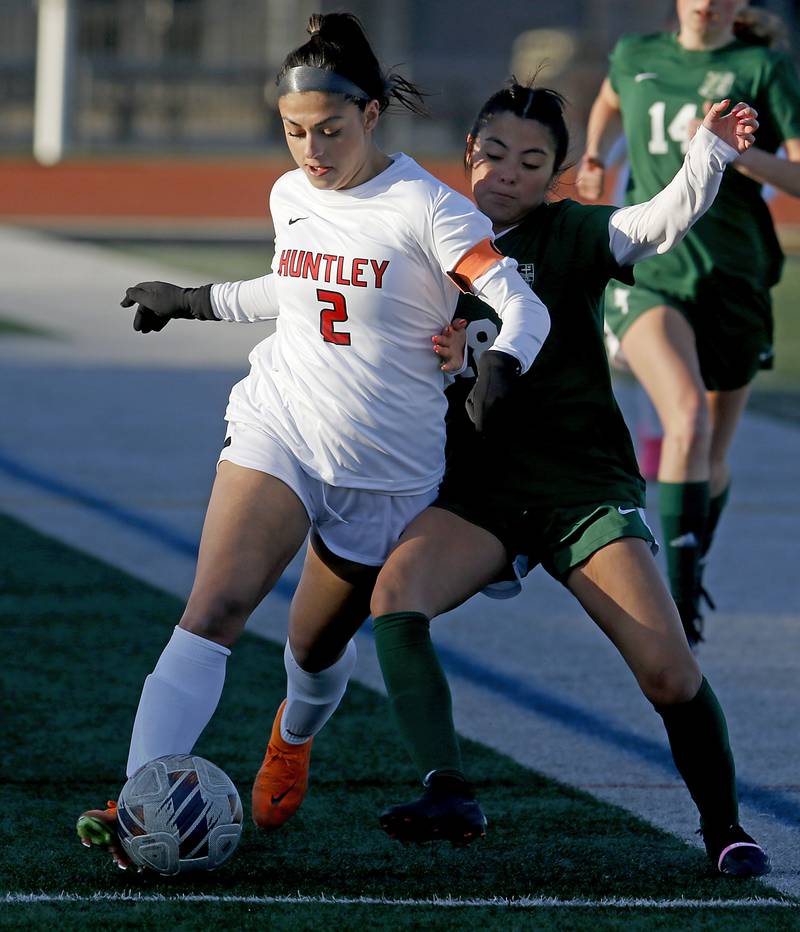 Huntley's Gabi Farraj controls the ball in front of Boylan Catholic's Leilani Gomez during a nonconference soccer game on Wednesday, March 27, 2024, at Huntley High School.
