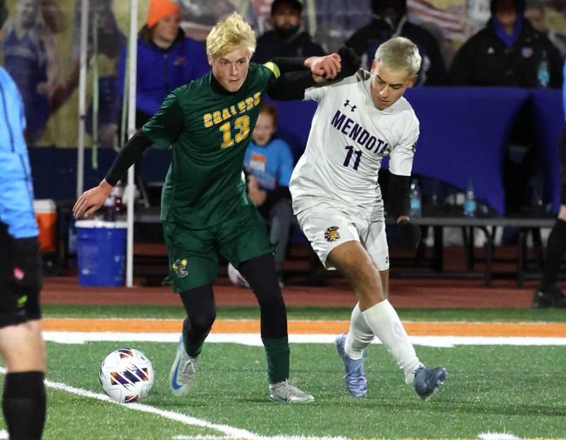 Coal City's Dane Noffsinger and Mendota's Cesar Casas try to run down the ball Thursday, Nov. 6, 2025, during their Class 1A state semifinal game at Hoffman Estates High School.