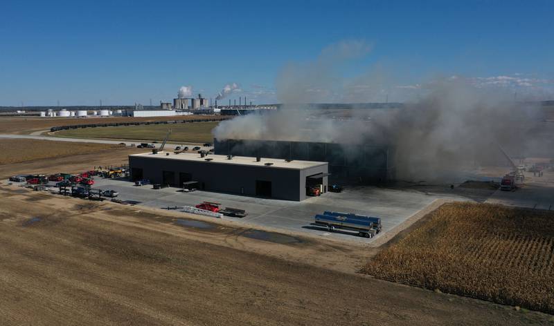 Smoke billows from Marquis Energy as firefighters work to control a structure fire on Wednesday, Oct. 8, 2025 in Hennepin. The fire was upgraded to a 5th alarm dispatching the (MABAS) Mutual Aid Box Alarm System. The fire broke out around 11a.m.