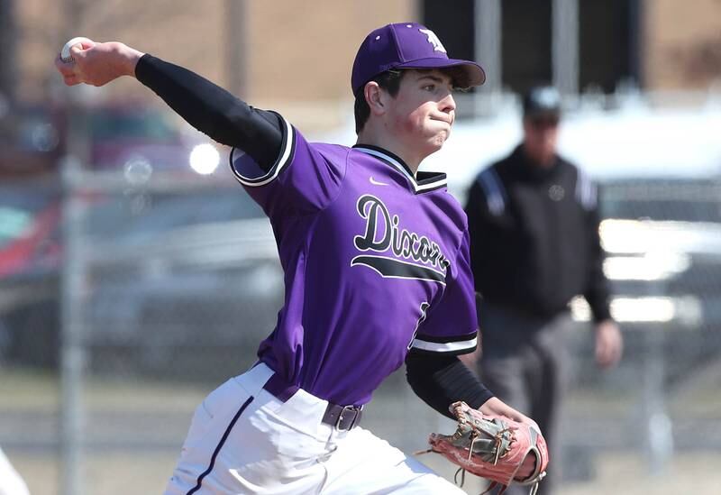 Dixon's Alex Harrison delivers a pitch during their game against DeKalb Tuesday, March 28, 2023, at DeKalb High School.