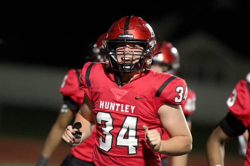 Huntley’s Haiden Janke celebrates a touchdown against Niles West in first-round Class 8A playoff football action at Huntley Friday.