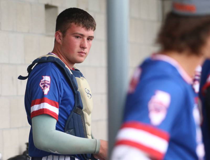 Marquette's Keaton Davis grabs his catcher gear during the ICA Senior Baseball All Star Game on Monday, June 30, 2025 at Schweickert Stadium in Peru.