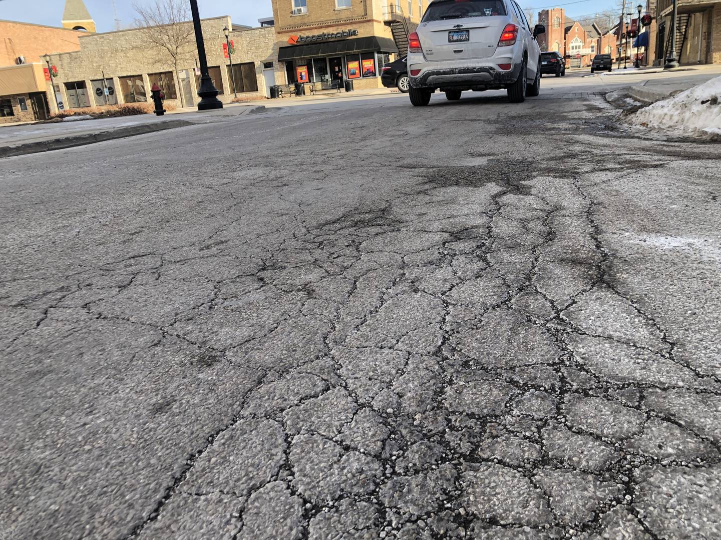 Harvard plans to leverage its 1% sales tax receipts by selling construction bonds and using the sales tax to pay off the bonds. First up for repaving is Ayer Street, seen here on Tuesday, Jan. 28, 2025.