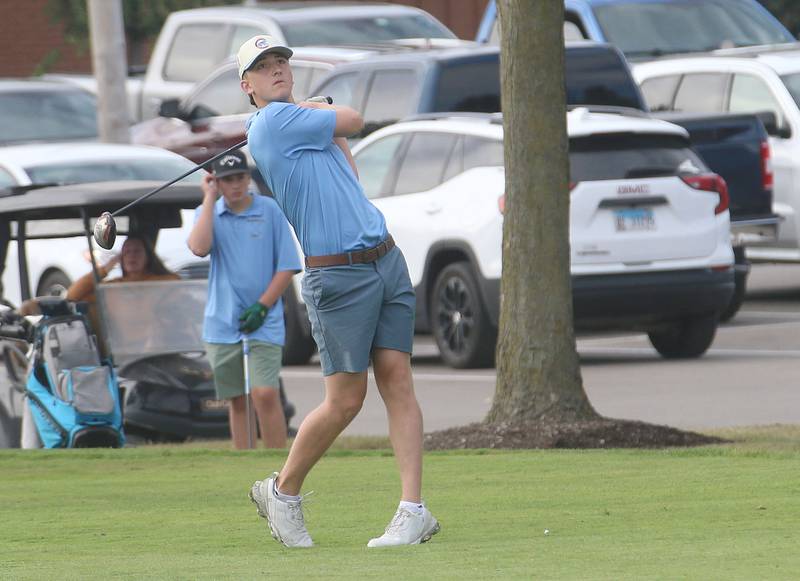 Marquette's Griffin Dobberstein tees off during the Class 1A Regionals on Wednesday, Oct. 1, 2025 at Deer Park Golf Club in Oglesby.