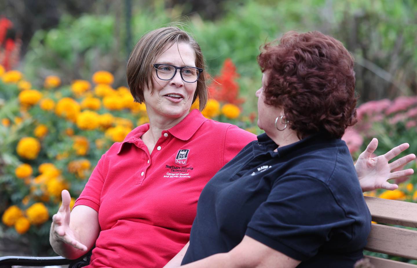 Sherrill Morris (left) from DeKalb and Diane Handlen, chat on a bench on the grounds of the Elwood House in DeKalb Friday, Sept. 23, 2022, during Handlen's visit to the area from the state of Maine. Morris and Handlen have been pen pals since the 1970's and recently met each other in person for the first time.