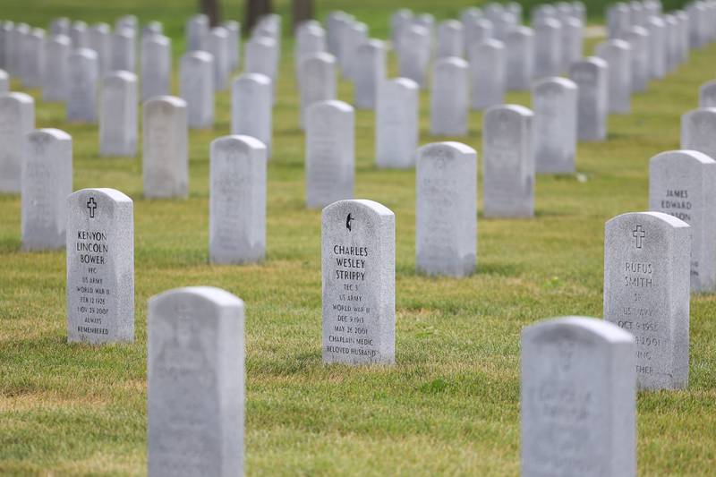 Headstones of members of the armed forces line the grounds at the Abraham Lincoln National Cemetery in Elwood on Saturday, July 29.