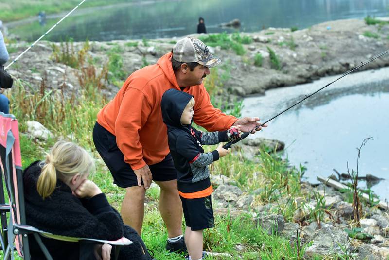 Former Prophetstown Police Chief Bruce Franks, was enjoying his retirement Saturday , June 14, 2025 with his grandson,  Joseph Thompson, 5, at the 19th annual Dick Brown Fishing Derby held at the Prophetstown State Park.
