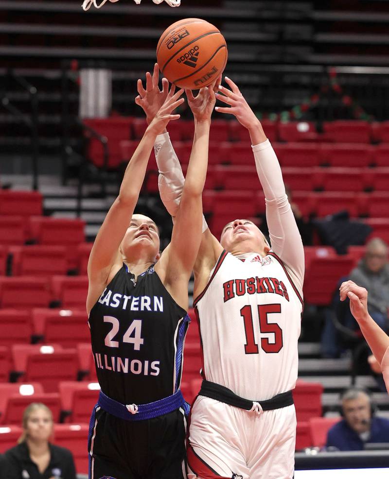 Northern Illinois' Grace Hunter (right) and Eastern Illinois' Ellie Buzzelle go after a rebound during their game Monday, Dec. 18, 2023, at the Convocation Center at NIU in DeKalb.