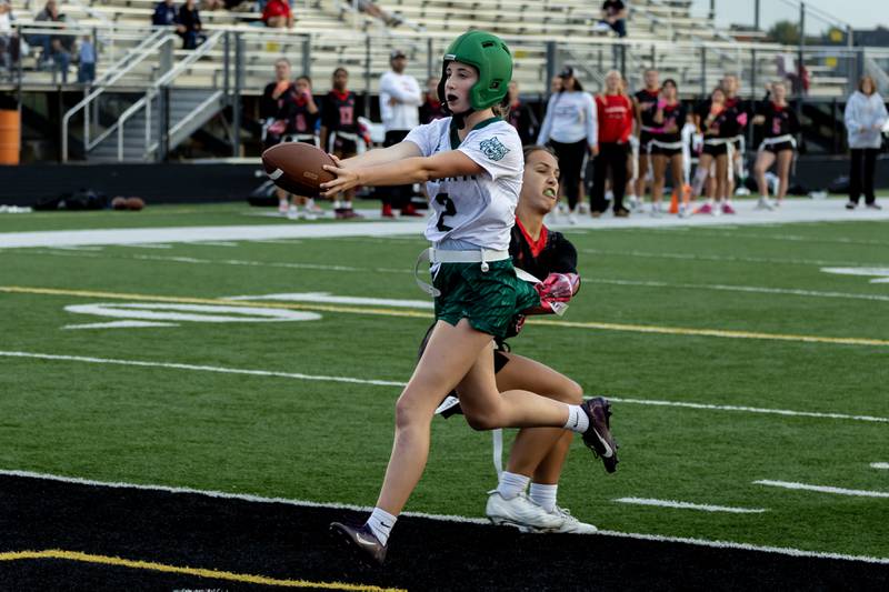 Plainfield Central's Alyssa Link scores a touchdown during the IHSA Danville Sectional varsity flag football game against Yorkville at Plainfield East on Oct. 13, 2025.