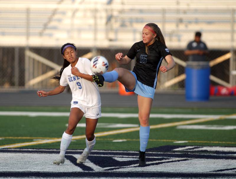 Geneva’s Rilee Hasegawa (left) and St. Charles North’s Lauren Balster (right) go after the ball during a Class 3A West Chicago Sectional semifinal on Tuesday, May 23, 2023.