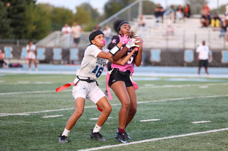 Kankakee's Je’Mya Williams grabs an interception over Plainfield South's Zahira Edwards during the Kays' 40-26 victory over Plainfield South on Monday, Oct. 6, 2025.