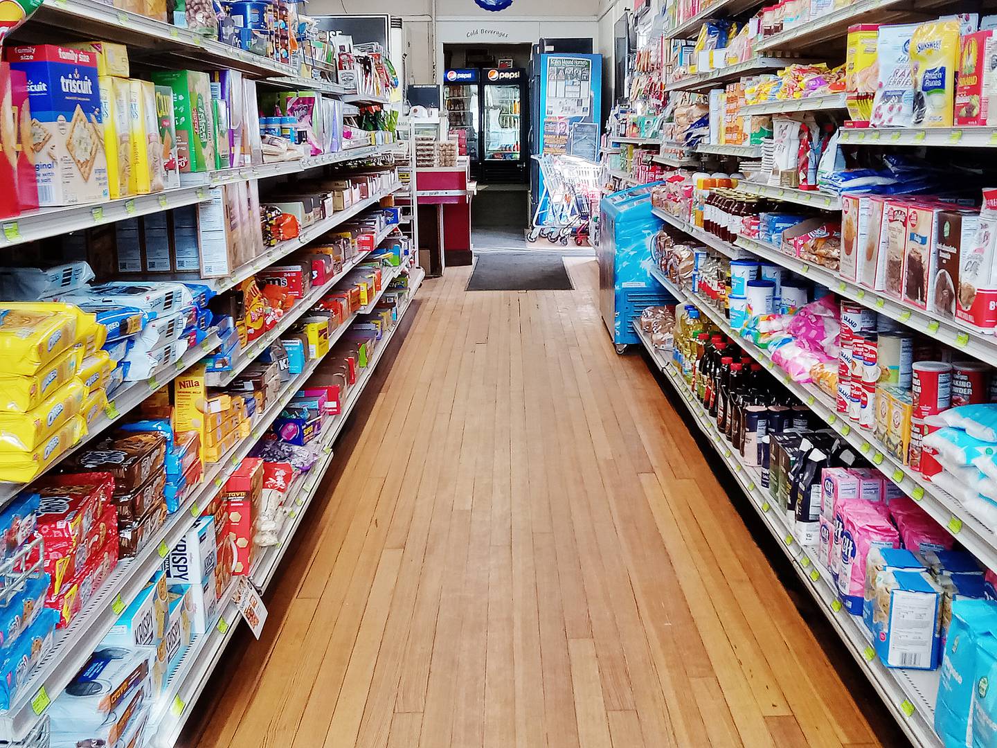 The wood floor still creaks at Country House Grocery in Scales Mound.
