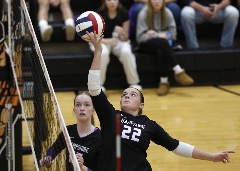 Hampshire's Kylie Lambert hits the ball over the net during an IHSA Class 4A McHenry Sectional volleyball match against Libertyville on Tuesday, Nov. 5, 2024, at McHenry High School Freshman Campus.
