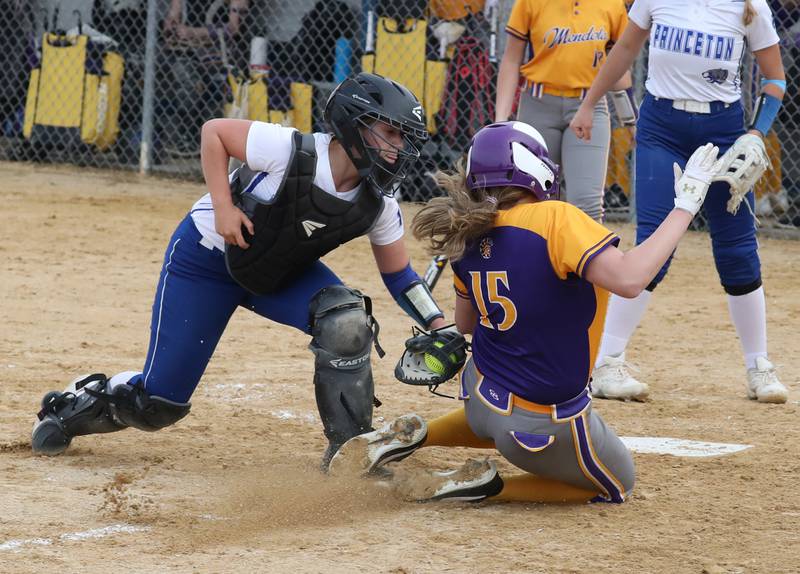 Princeton catcher Izzy Gibson puts the tag on Mendota's Reanna Brant to complete a double play Monday at Princeton.