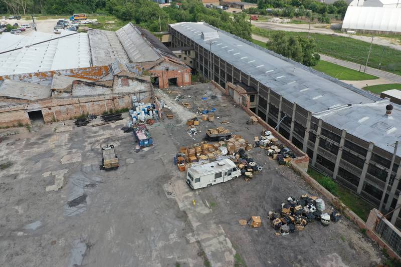 An aerial view of the storage area behined the historic Westclox building on Monday, July 17, 2023 in Peru. The building caught fire last Friday when an unattended fire behind the the building  was the cause of the larger fire in the building.