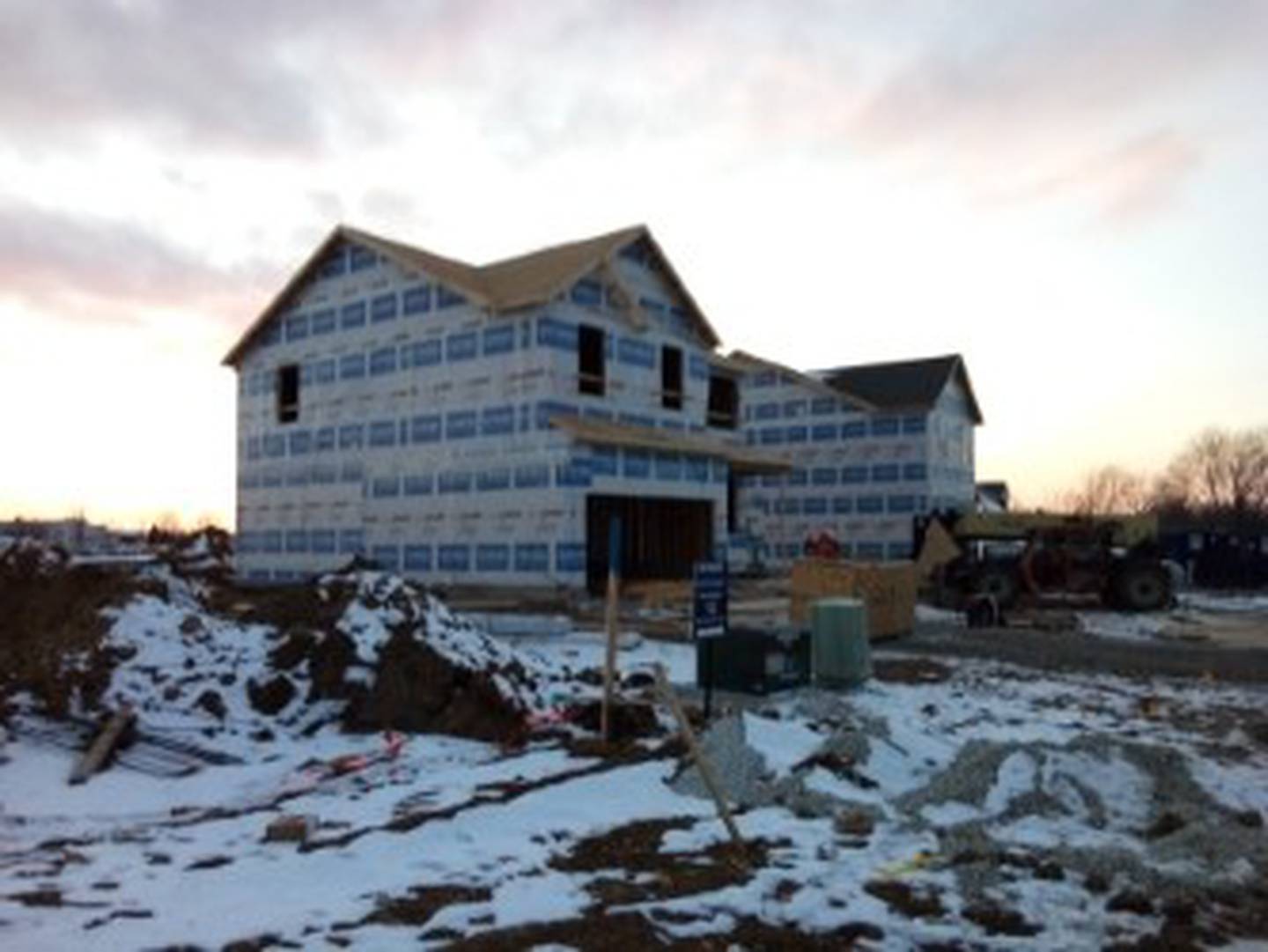 A two-story house is seen under construction in the Prairie Landing subdivision in Joliet. Feb. 3, 20