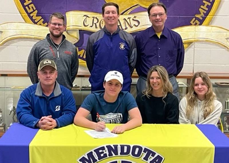 Mendota's Ethan Hanaman (seated, center) signed to play golf at Missouri Baptist. He was joined by (seated left to right), his parents Matt and Bcki Hanaman and sister, Natalie and (standing left to right) Craig McConville, Mendota coach David Ross and former MHS coach Brian Blumhorst.
