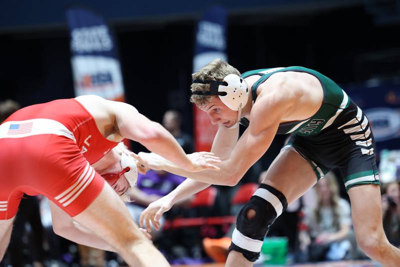 Coal City's Luke Munsterman wrestles Vandalia's Brody Matthews in the 138-pound match during the Coalers' victory over Vandalia in the IHSA Class 1A Dual Team State championship on Saturday, Feb. 28, 2026.