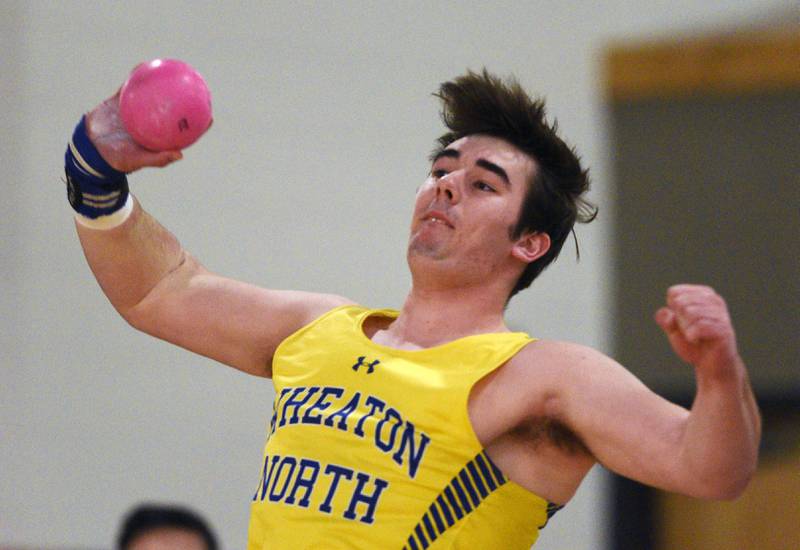 Wheaton North’s Jonathan Hurst throws the shot put during the DuKane Conference indoor track meet at Batavia High School on Friday, March 21, 2025.