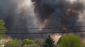 Brush fire burns over 100 acres in Island Lake
