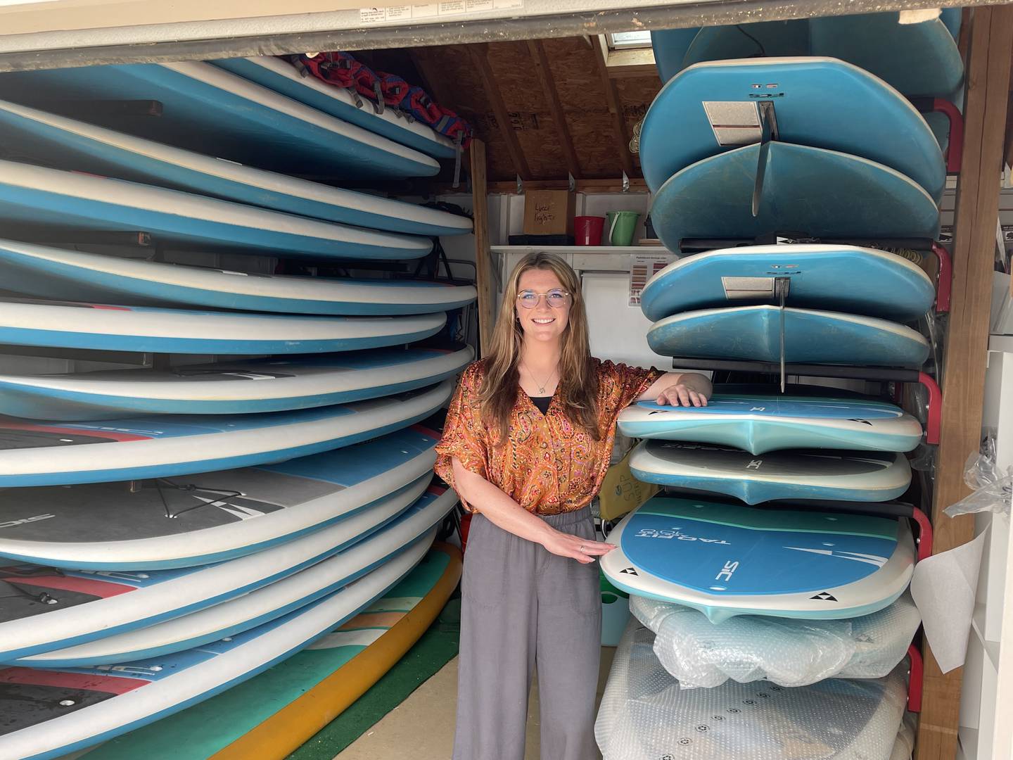 The TAO Fit SIC stand-up paddleboards available to rent at The Board House at Three Oaks Recreation Area are great for novice and experienced paddleboarders, according to the rental and lessons facility's new co-owner, McKenna Dunn.