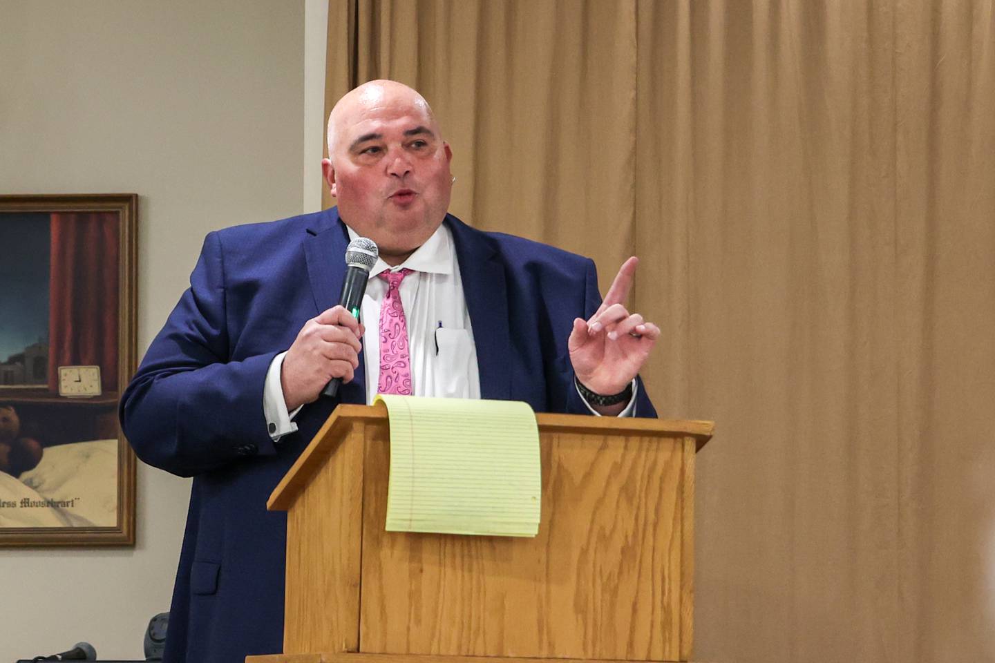 Bureau County States Attorney Candidate Brad Popurella speaks to crowd at debate on Wednesday, October 2, 2024 at Moose Lodge in Princeton.