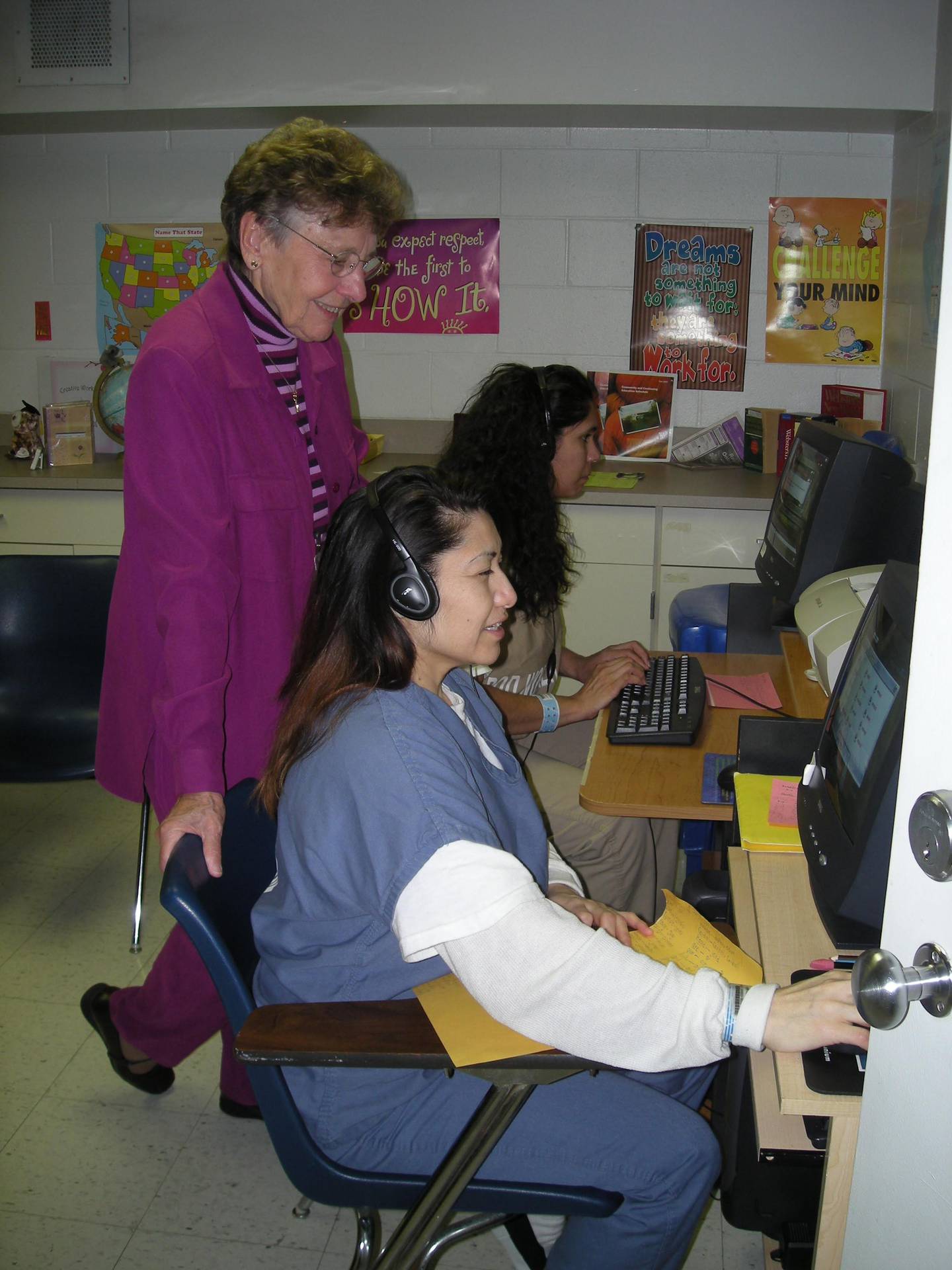 Sister Vivian Whitehead is seen assisting several student residents of the Will County Detention Center in Joliet on computers in this undated photo.