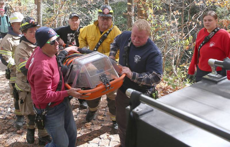 Utica and Oglesby firefighters and paramedics transport a 16-year old male who fell approximately 30 feet in the area of Cedar Point overlook on Friday, Oct. 24, 2025 at Matthiessen State Park in Oglesby. Utica and Oglesby Fire and EMS responded to the park just before 1p.m. The 16-year old patient from Elmhurst, fell down part of an embankment. Rescuers transported him to the Matthiessen shelter using a six-wheeler and then transferred by ambulance to OSF St. Elizabeth Peru. The patient suffered non-life-threatening injuries.