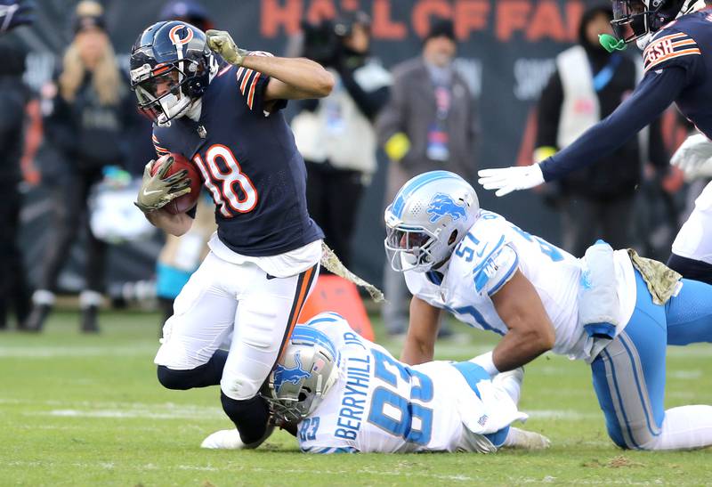 Chicago Bears wide receiver Dante Pettis is brought down by Detroit Lions’ Stanley Berryhill in the fourth quarter of their game Sunday, Nov. 13, 2022, at Soldier Field in Chicago.