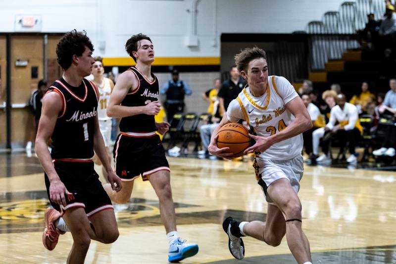 Joliet West's Ryan Lipke drives to the basket during a varsity boys basketball game against Minooka at Joliet West on Jan. 6, 2026.